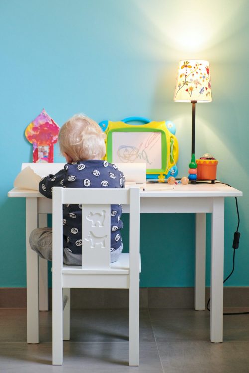 kid coding at desk